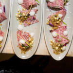 Takeda Farms Reserve Wagyu Beef Crudo with Fermented Corn, Farm Radish, Smoked Foam, Red Fife Bread Crumbs, Shaved Bone Marrow, and Farm Corn Shoots