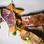 Joseph Decuis Wagyu Beef Rib-Eye with Sunchoke–Chestnut Purée, Potato Confit, Farm Carrots, Spinach Purée, and Demi-Glace